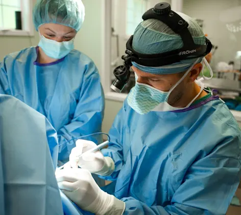 Surgeons performing surgery Surgeons performing surgery