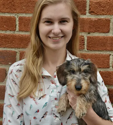 Photo of Aleksandra Skorobgatova with a dog Photo of Aleksandra Skorobgatova with a dog