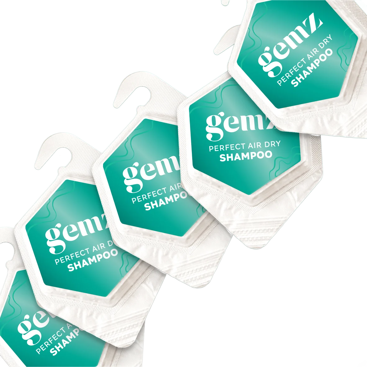 Gemz Perfect Air Dry Shampoo packets arranged diagonally on a gradient background.