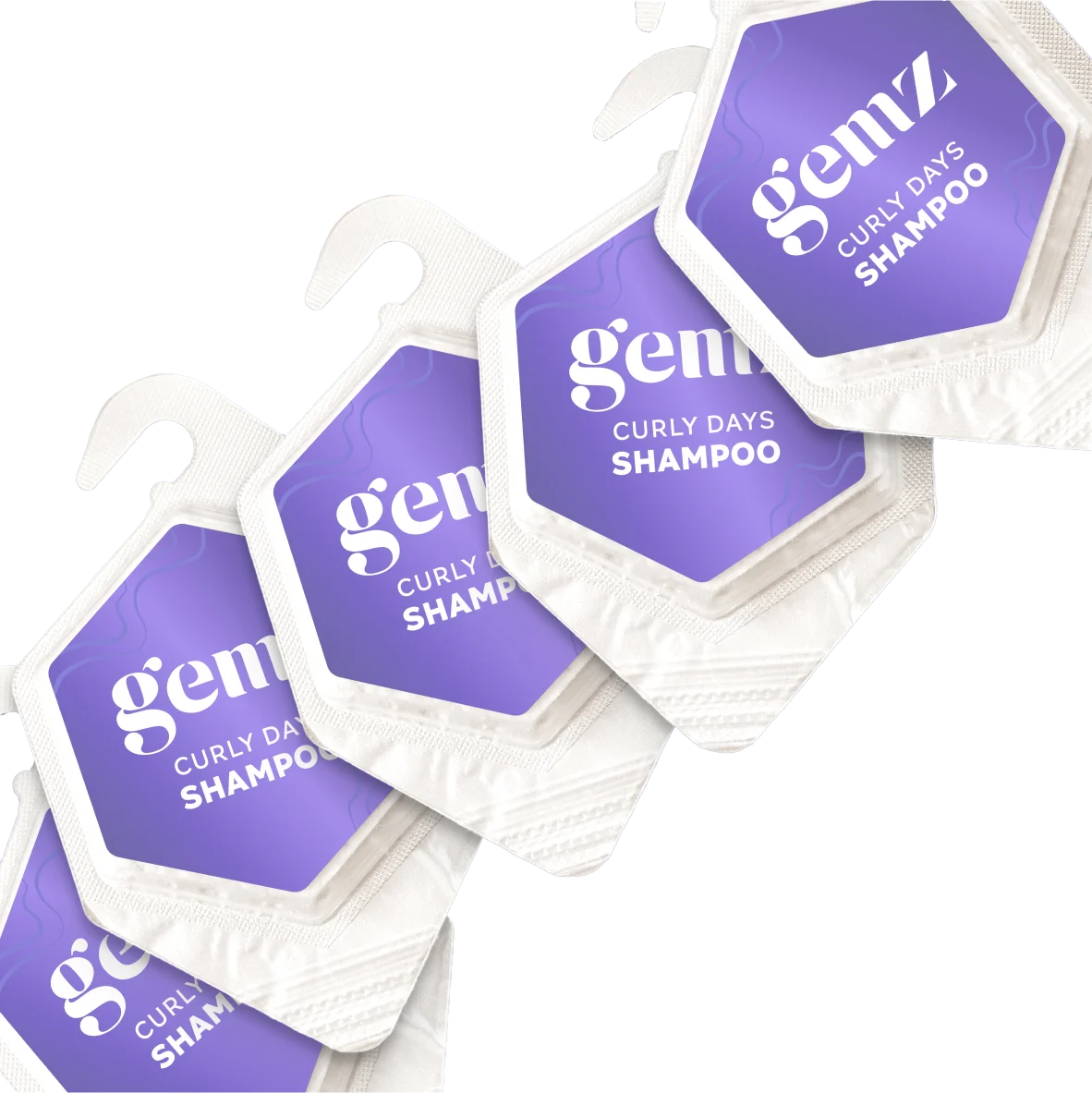 Curly Days Shampoo sachets with purple labels, arranged on a light gradient background.