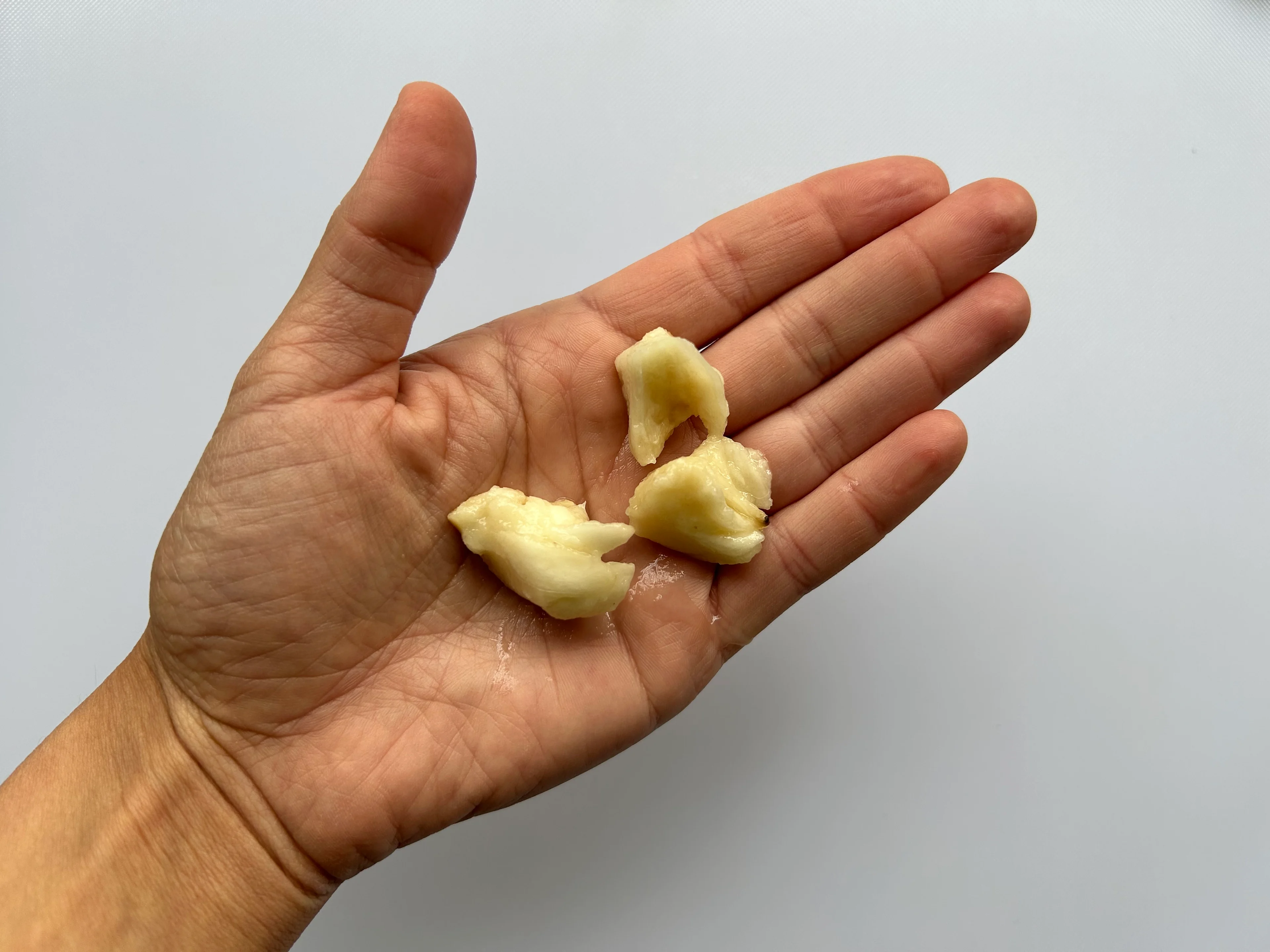 Cherimoya bite-sized pieces hand pic