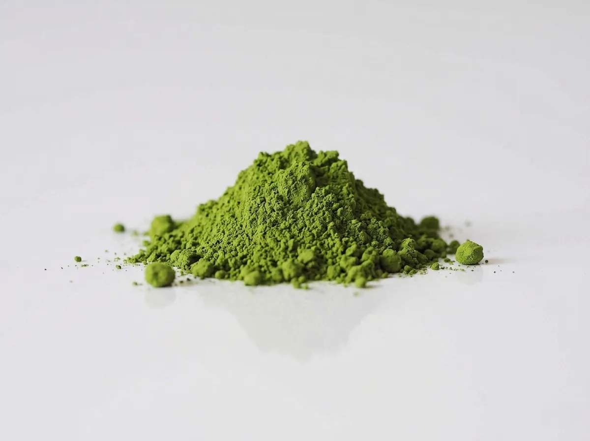 a photograph of a small pile of matcha powder