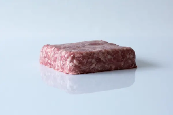 When can babies have ground pork a photograph of a small portion of raw pork on a white background