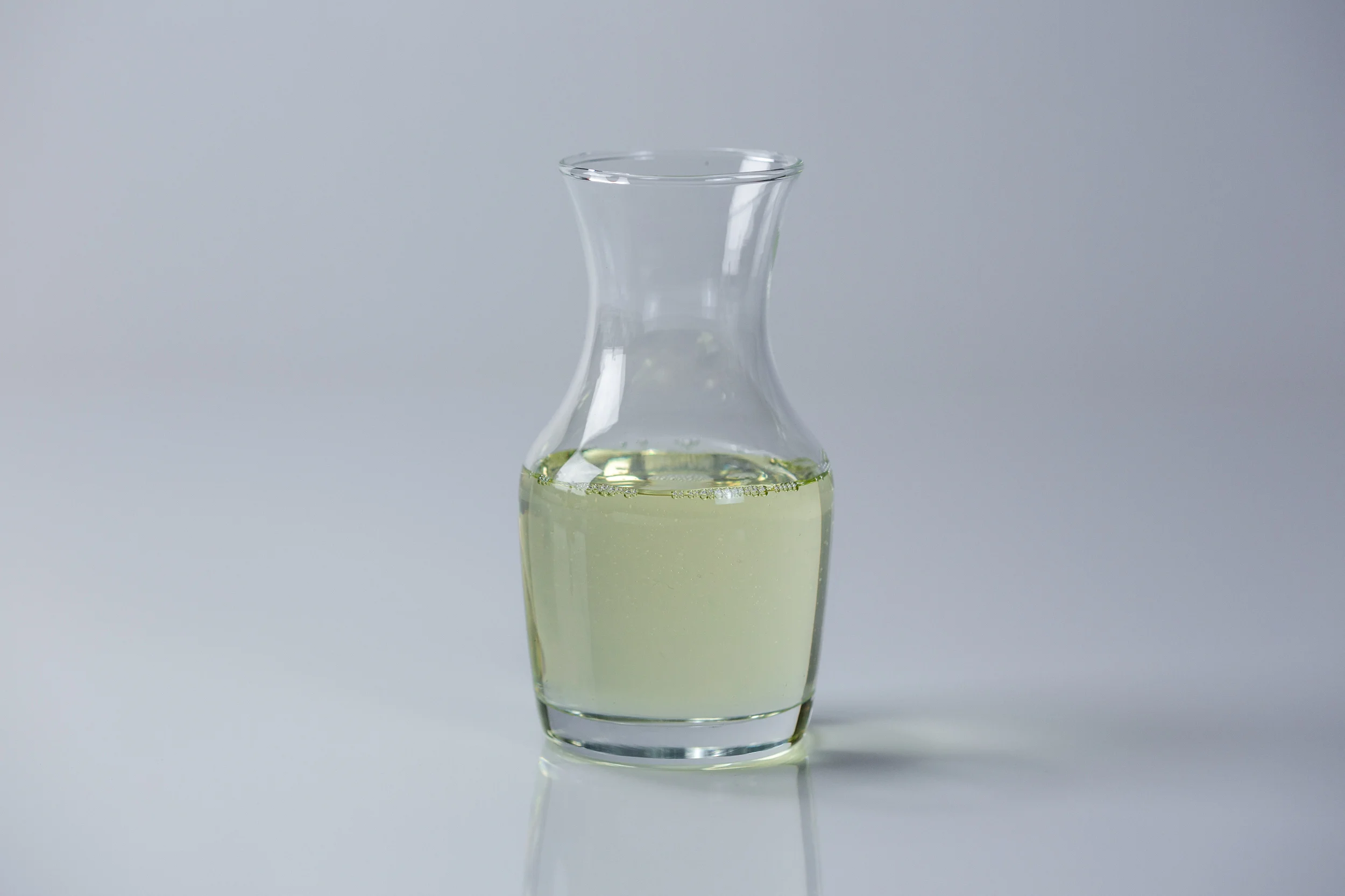A photo of a jar with canola oil