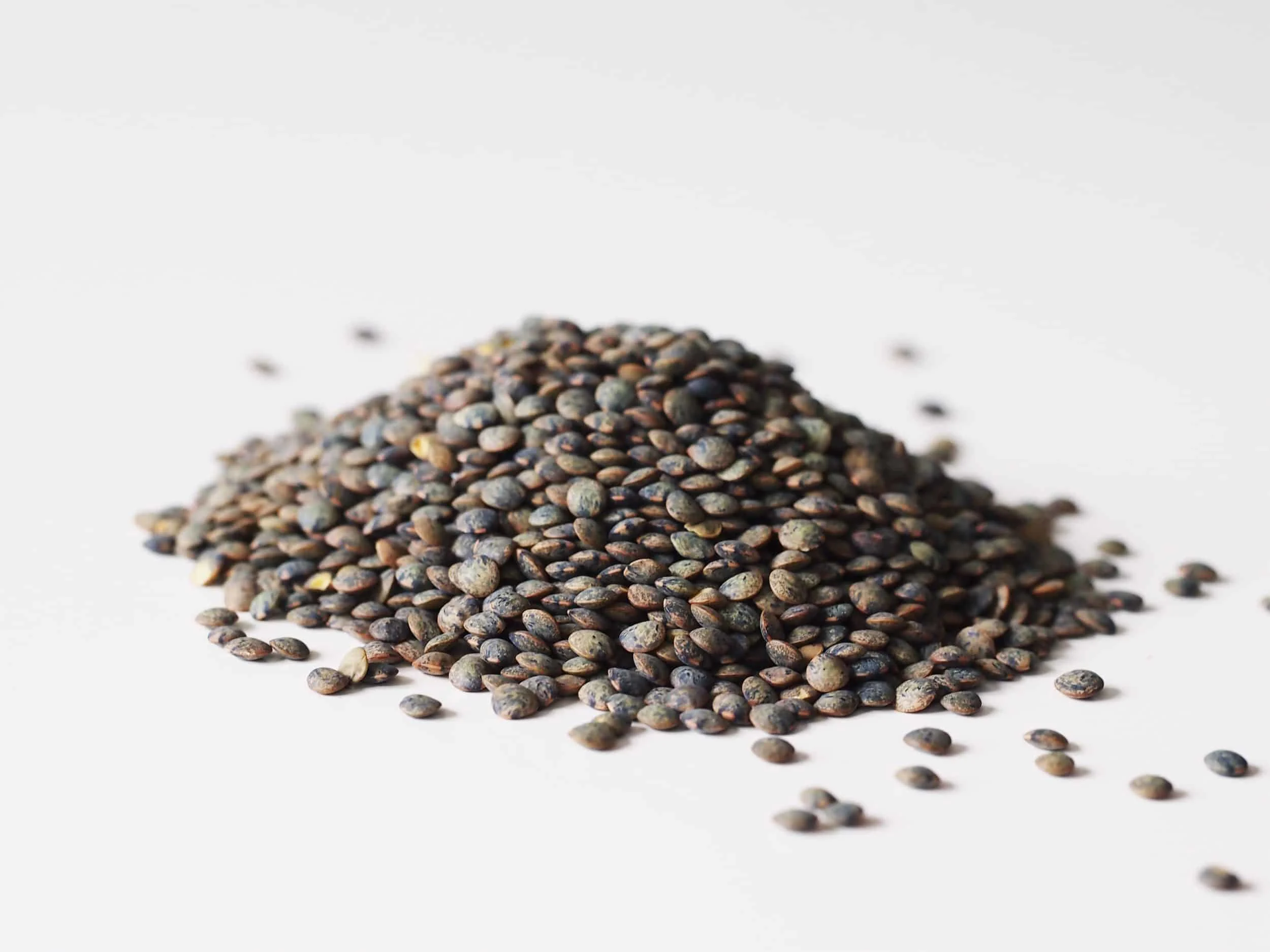 A pile of lentils before they have been prepared for a baby starting solid foods