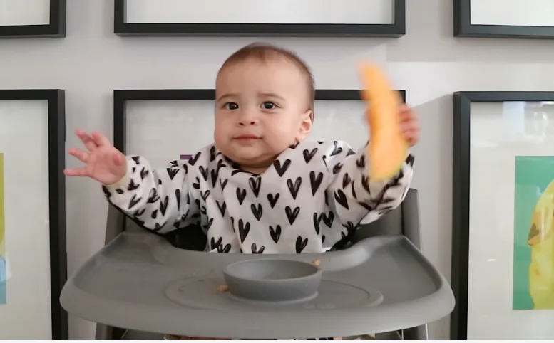 Liam throwing melon