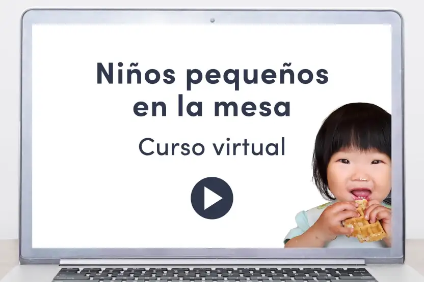 una computadora portátil mostrando un video con el texto curso virtual para prevenir alimentación quisquillosa y un niño pequeño sosteniendo una fruta naranja sobre su cabeza 