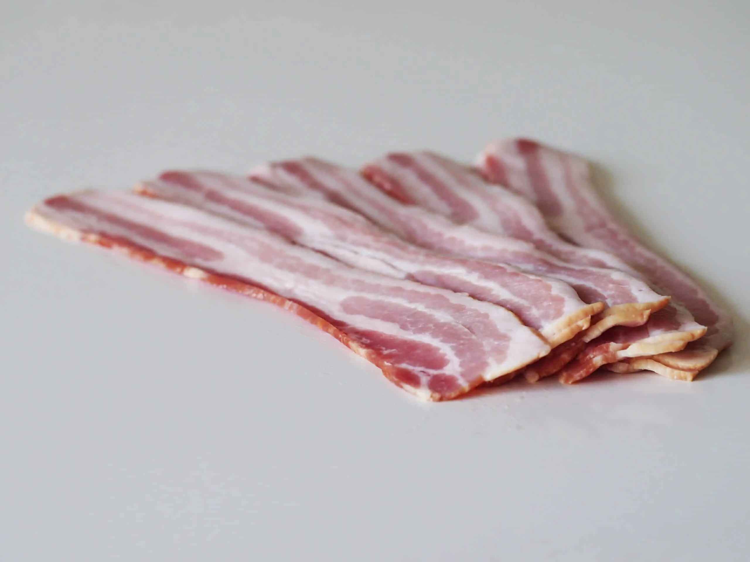 raw bacon strips before preparing for toddlers