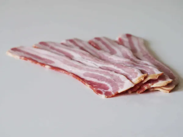 raw bacon strips before preparing for toddlers