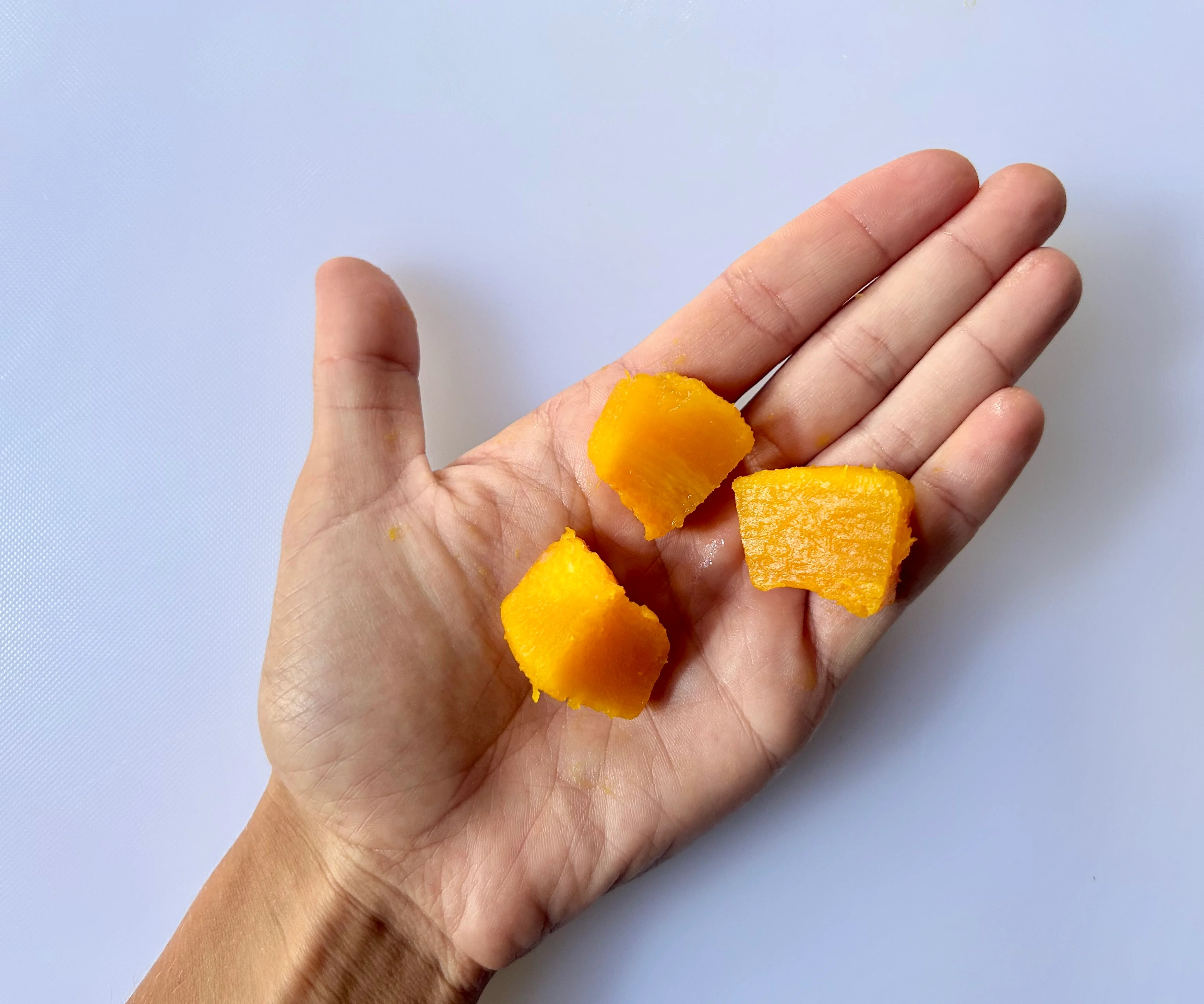 Pumpkin bite-sized pieces hand pic