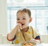 a baby eats chicken when starting solids