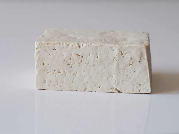 a block of tofu before it is prepared for a baby starting solids