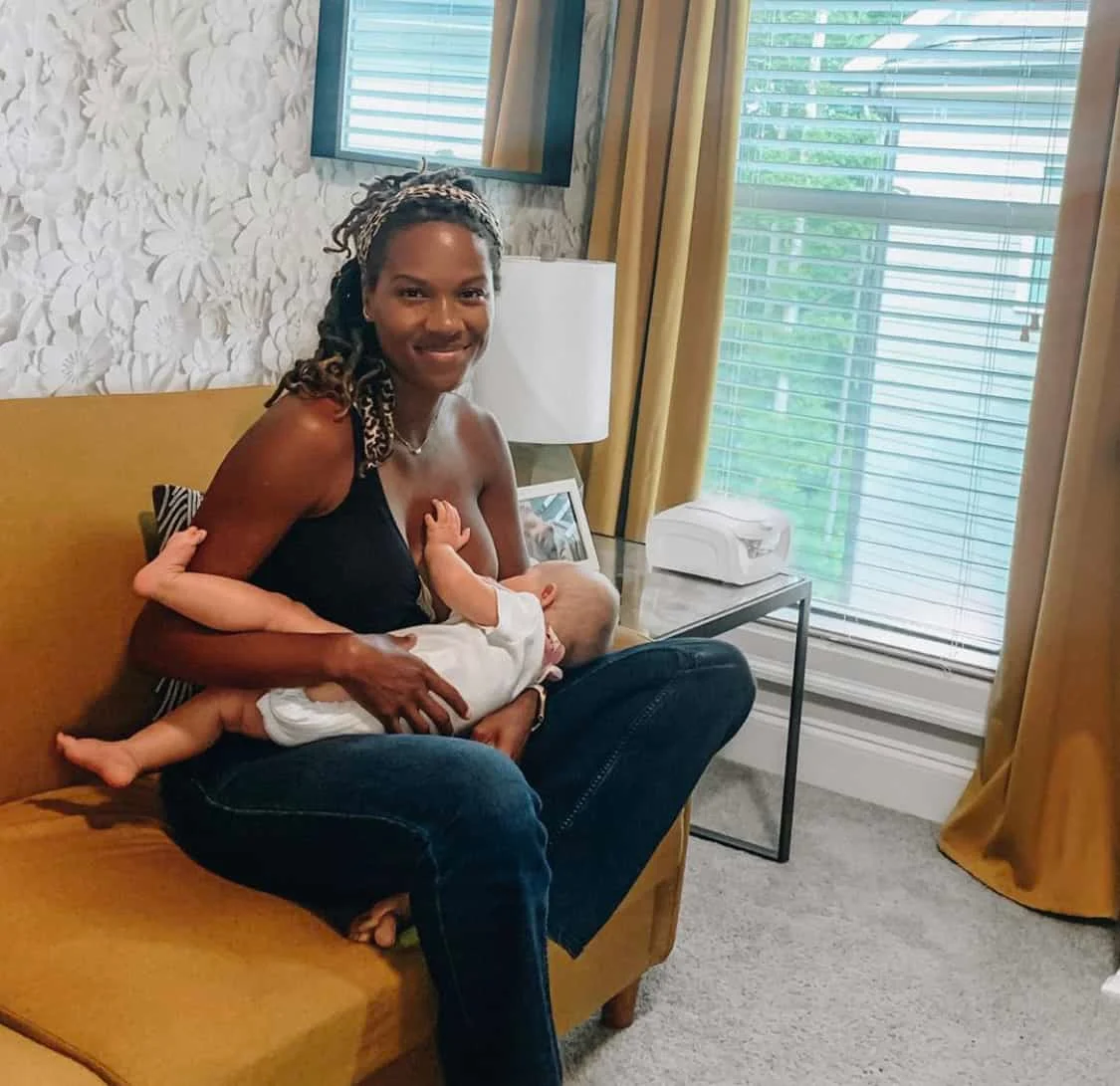 Mother Chrissy Rodriguez breast feeds her baby