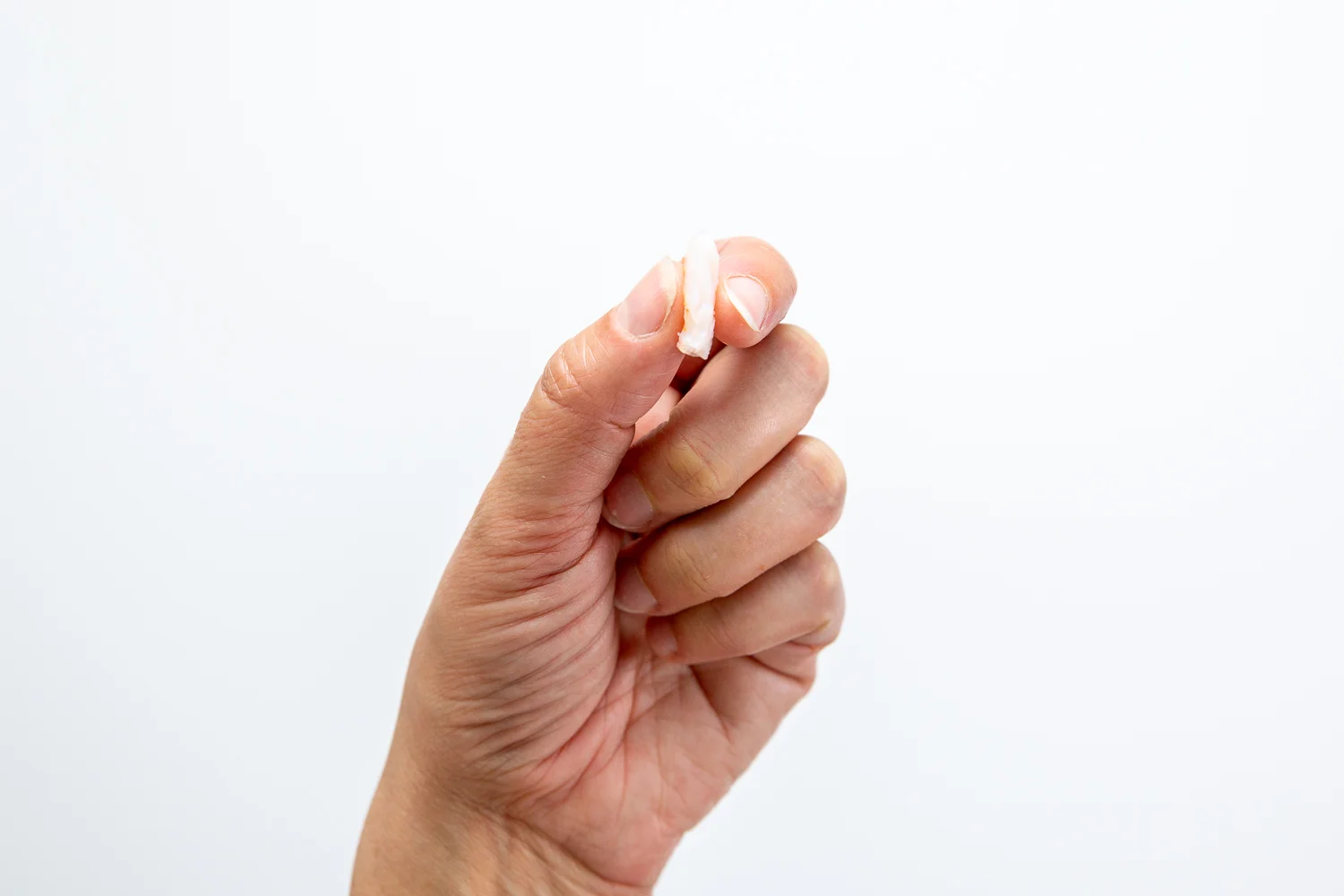 Shrimp bite-sized pieces side view hand pic