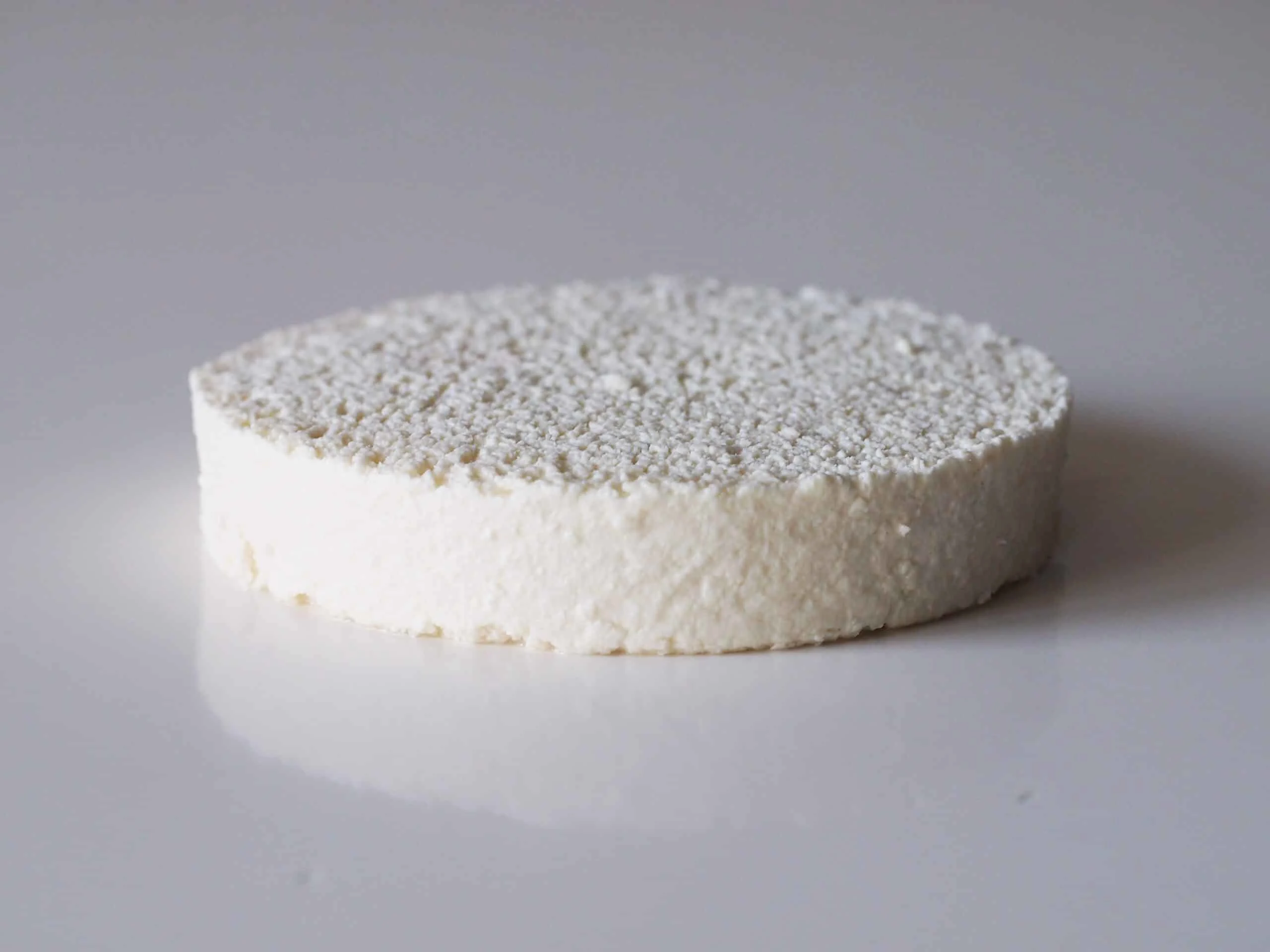 a wheel of queso fresco ready to be prepared for toddlers