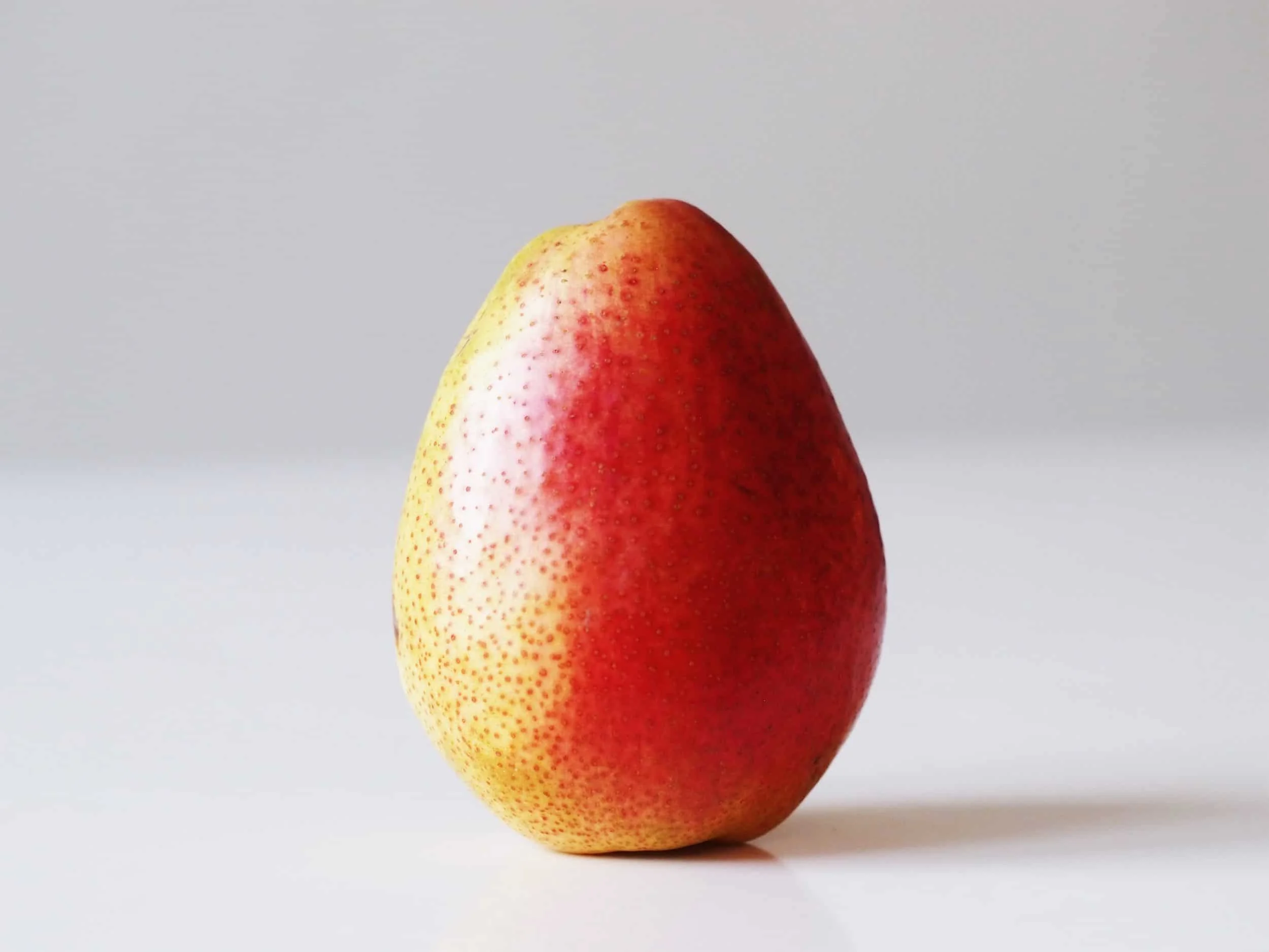 a whole pear before being prepared for babies starting solid food