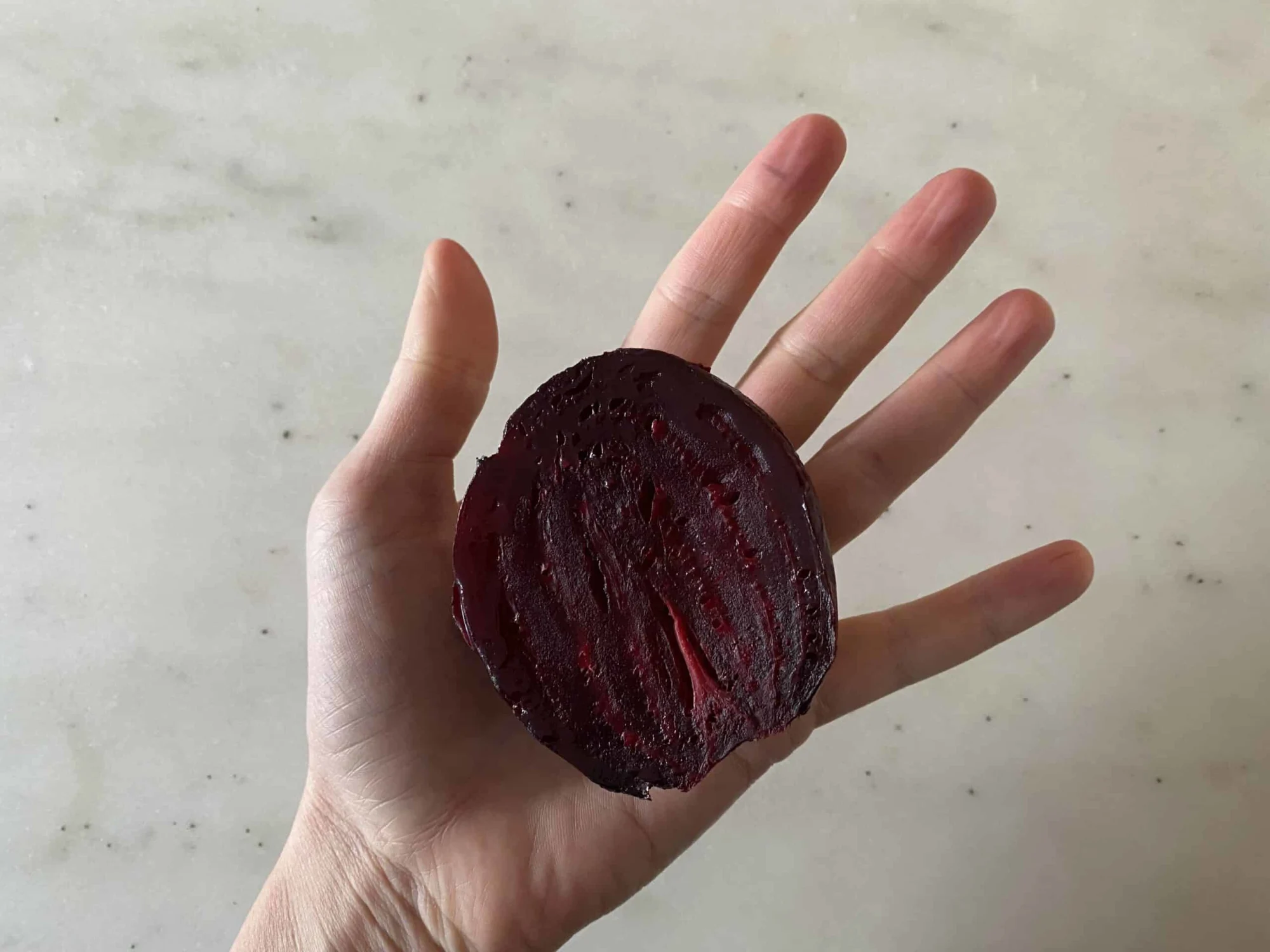 a cooked beet cut in half for babies starting solids