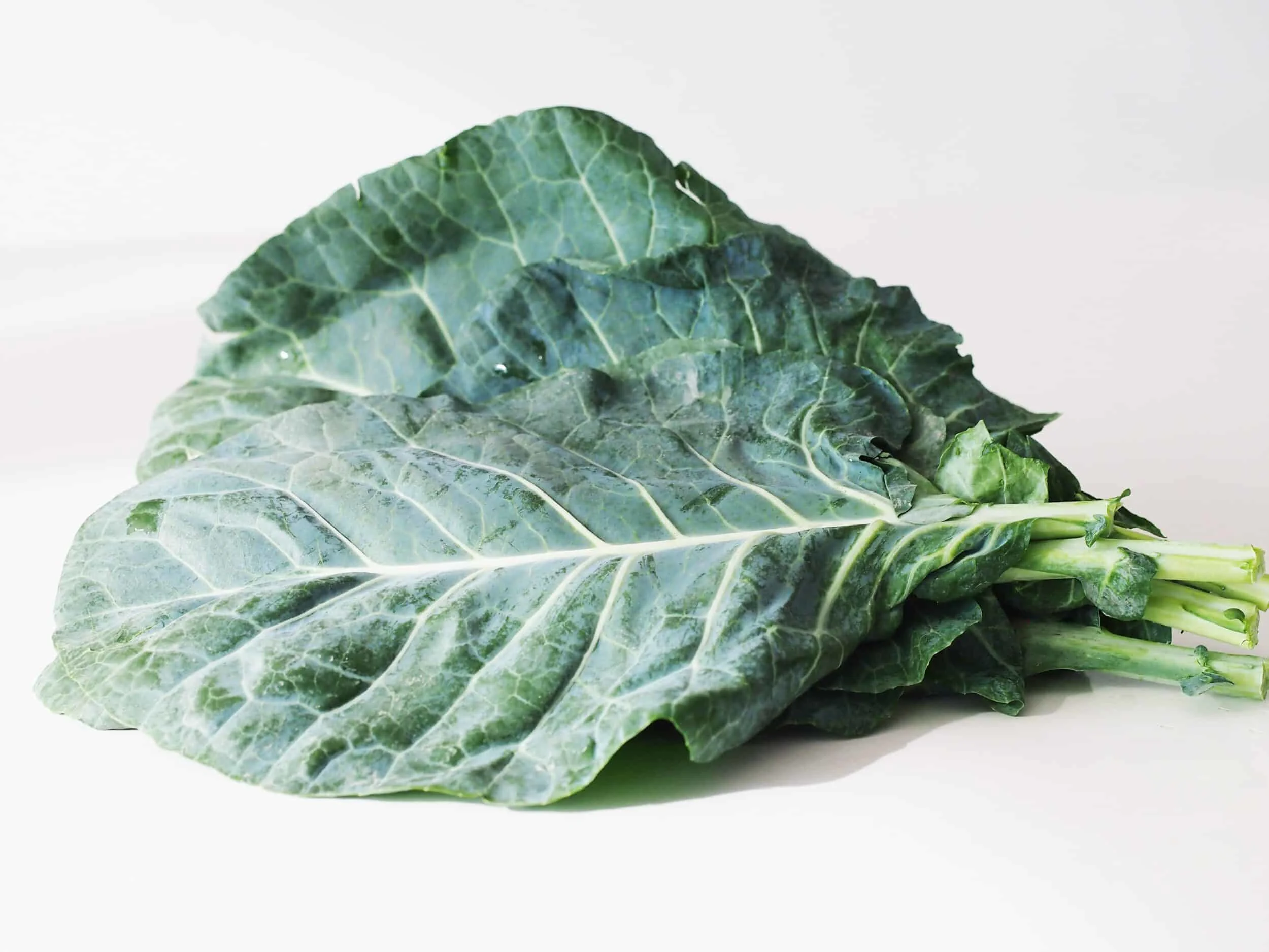 a bunch of collard greens before being prepared for babies starting solids