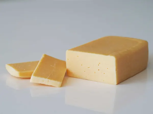a blog of havarti cheese and two slices before being prepared for babies starting solid food