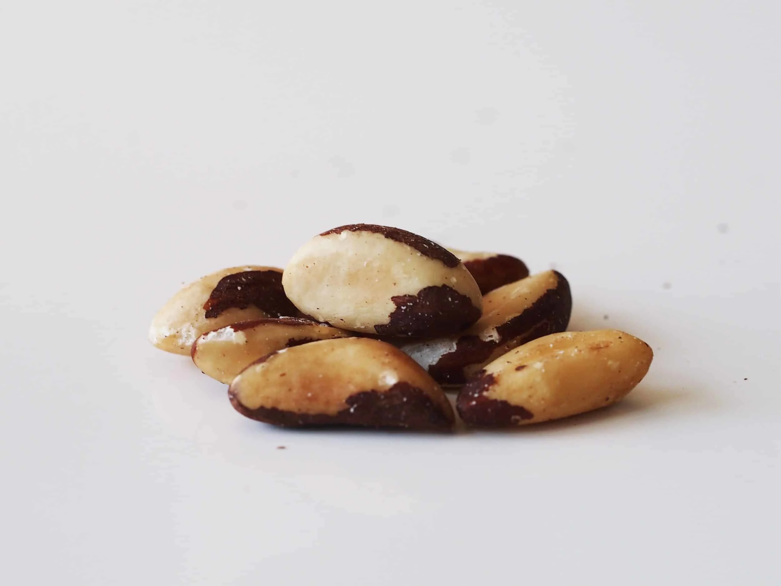 a pile of brazil nuts before being prepared for babies starting solid food