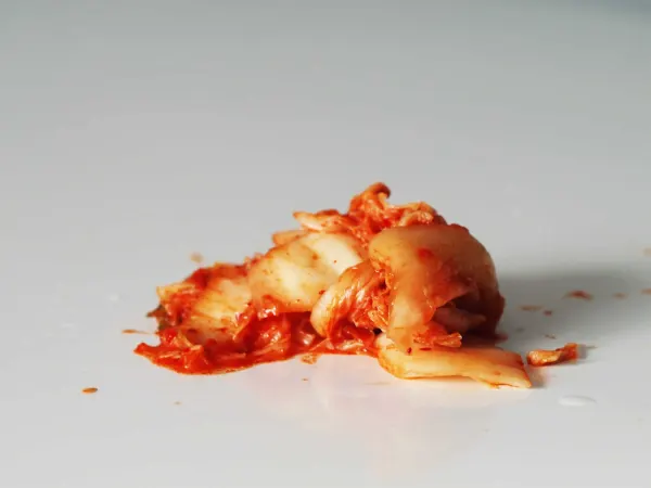 a pile of kimchi on a table before being prepared for babies starting solid food