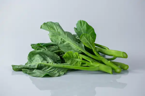 a photograph of gai lan (chinese broccoli)