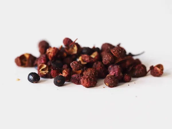 a pile of Sichuan peppercorns before being prepared for babies starting solid food