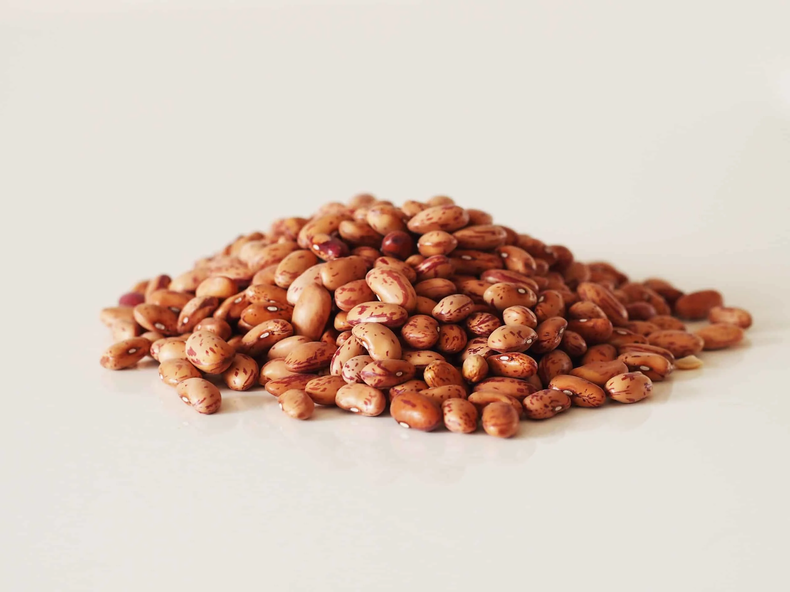 a pile of cranberry beans ready to be prepared for babies starting solids