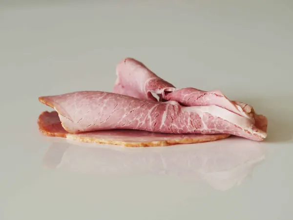 slices of ham ready to be prepared for children to eat