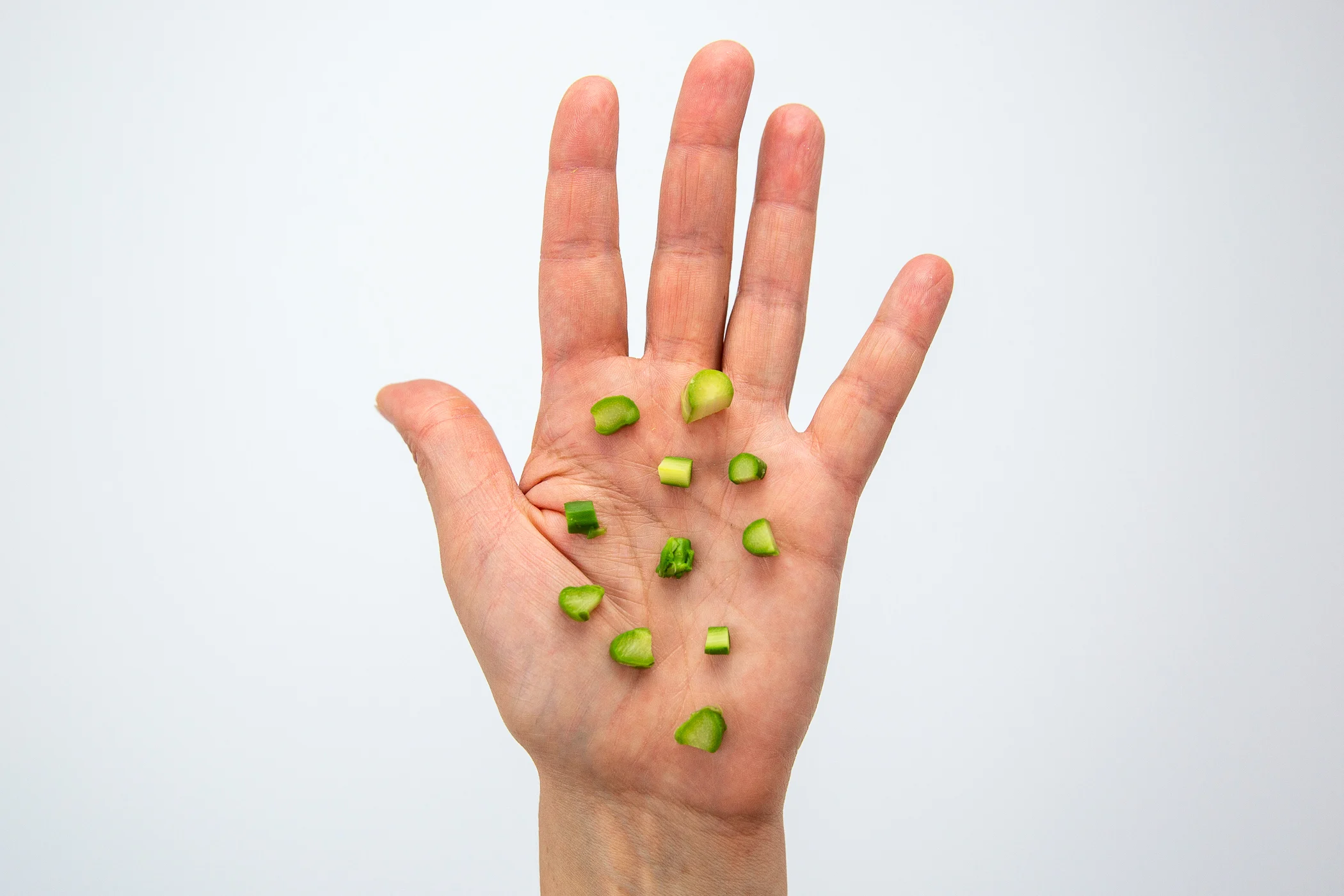 Asparagus chopped cut lengthwise hand pic