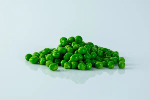 peas on a table before being prepared for babies starting solid food