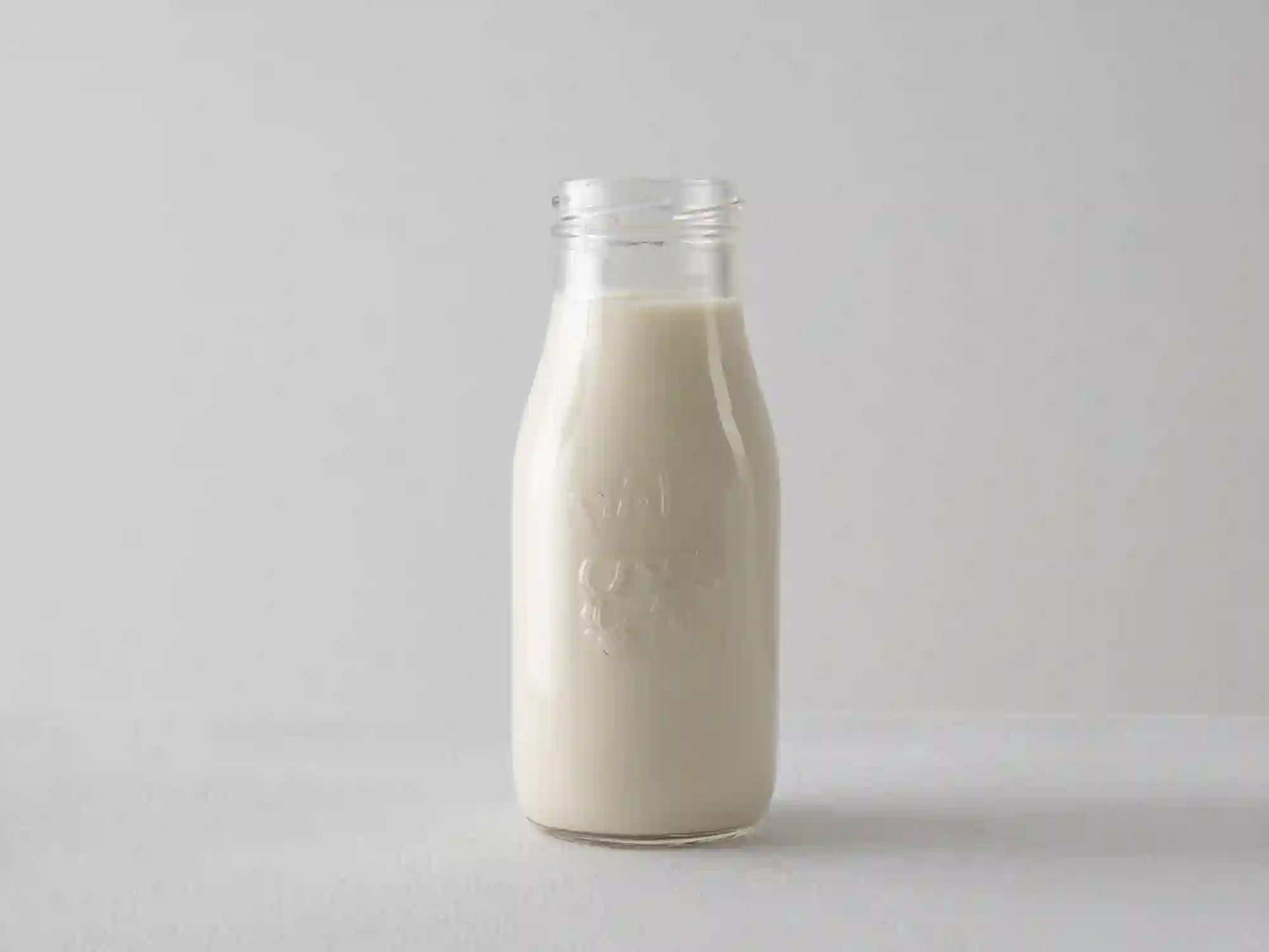 A glass bottle of cow's milk