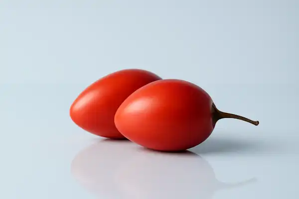 When can babies have tamarillo a photograph of two whole tamarillos on a white background