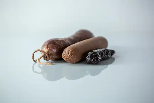 three different types of blood sausage next to each other on a white background