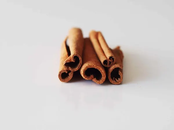 a pile of cinnamon sticks before being prepared for babies starting solids