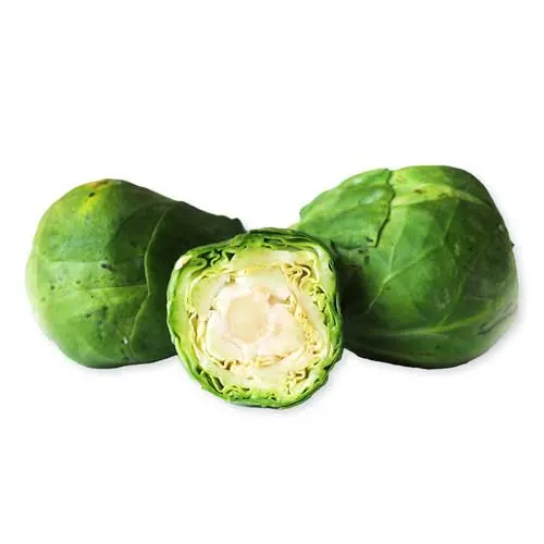 a photograph of three raw brussels sprouts on a white background