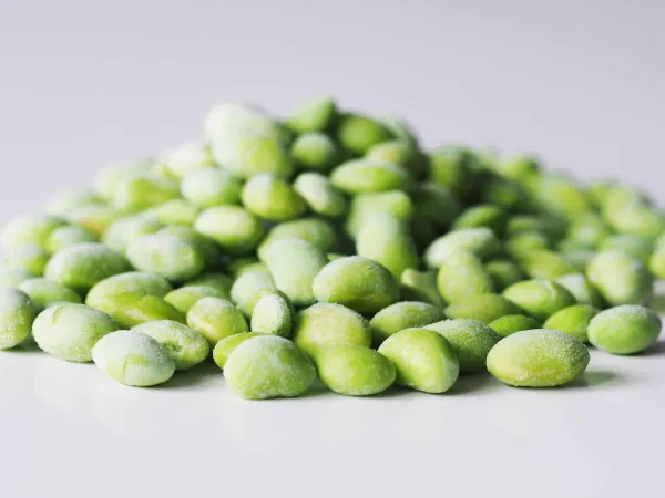 a pile of edamame beans before being prepared for babies starting solids