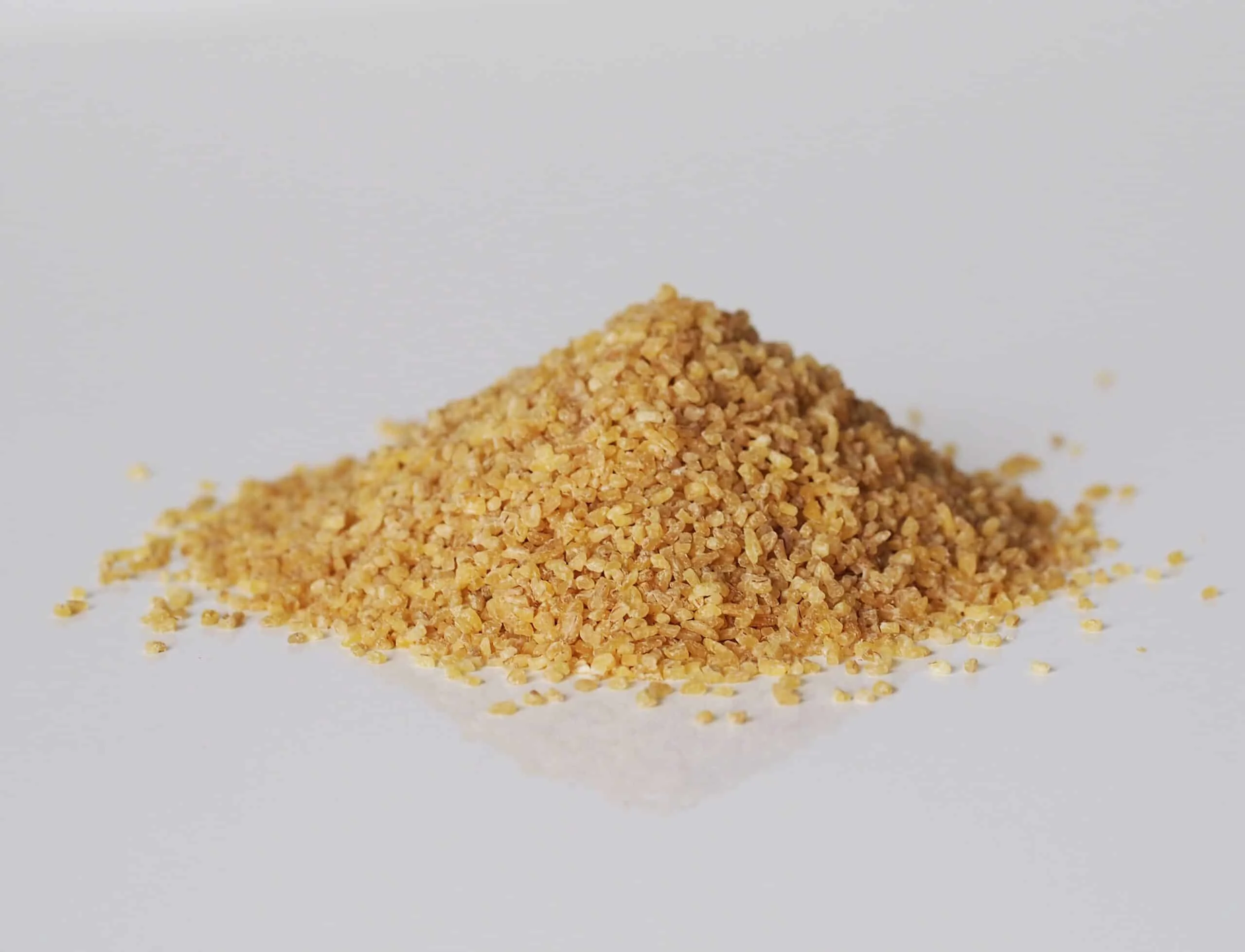 a pile of uncooked bulgur wheat ready to be cooked for babies starting solids
