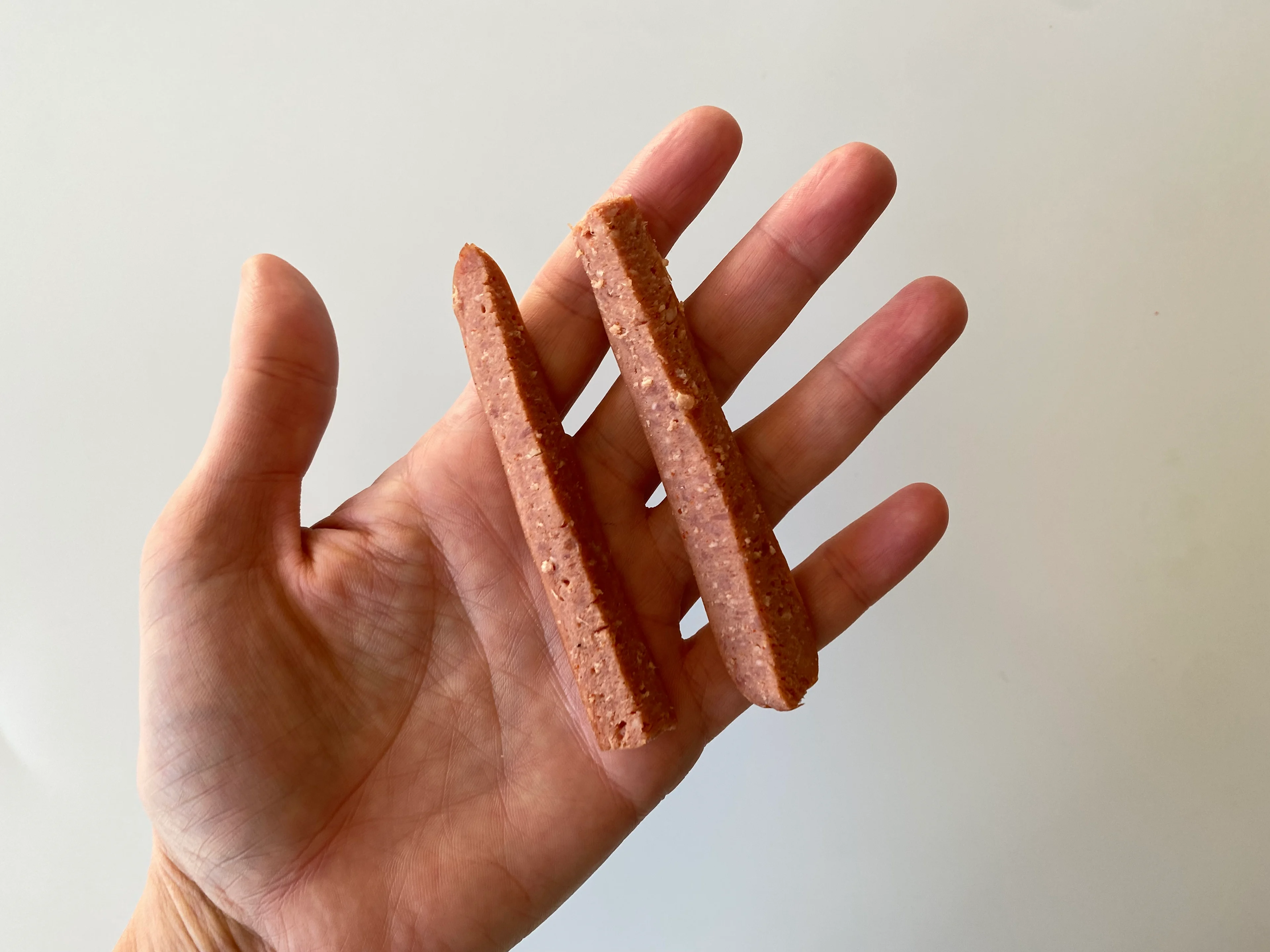Hot dog quartered lengthwise