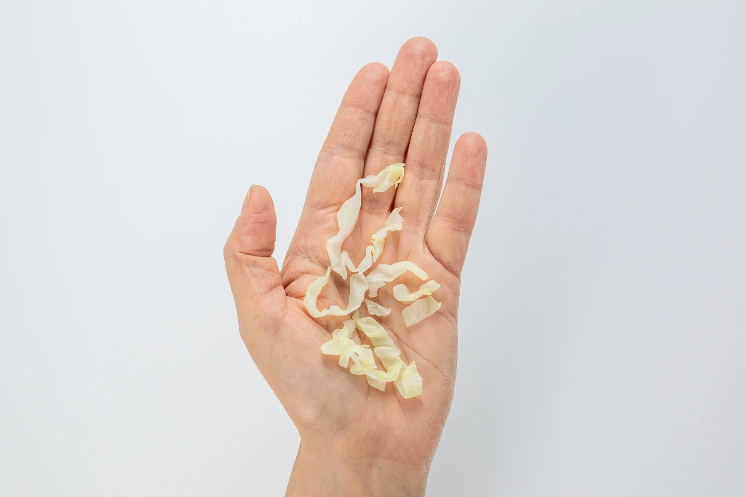 Cabbage cooked shreds hand pic