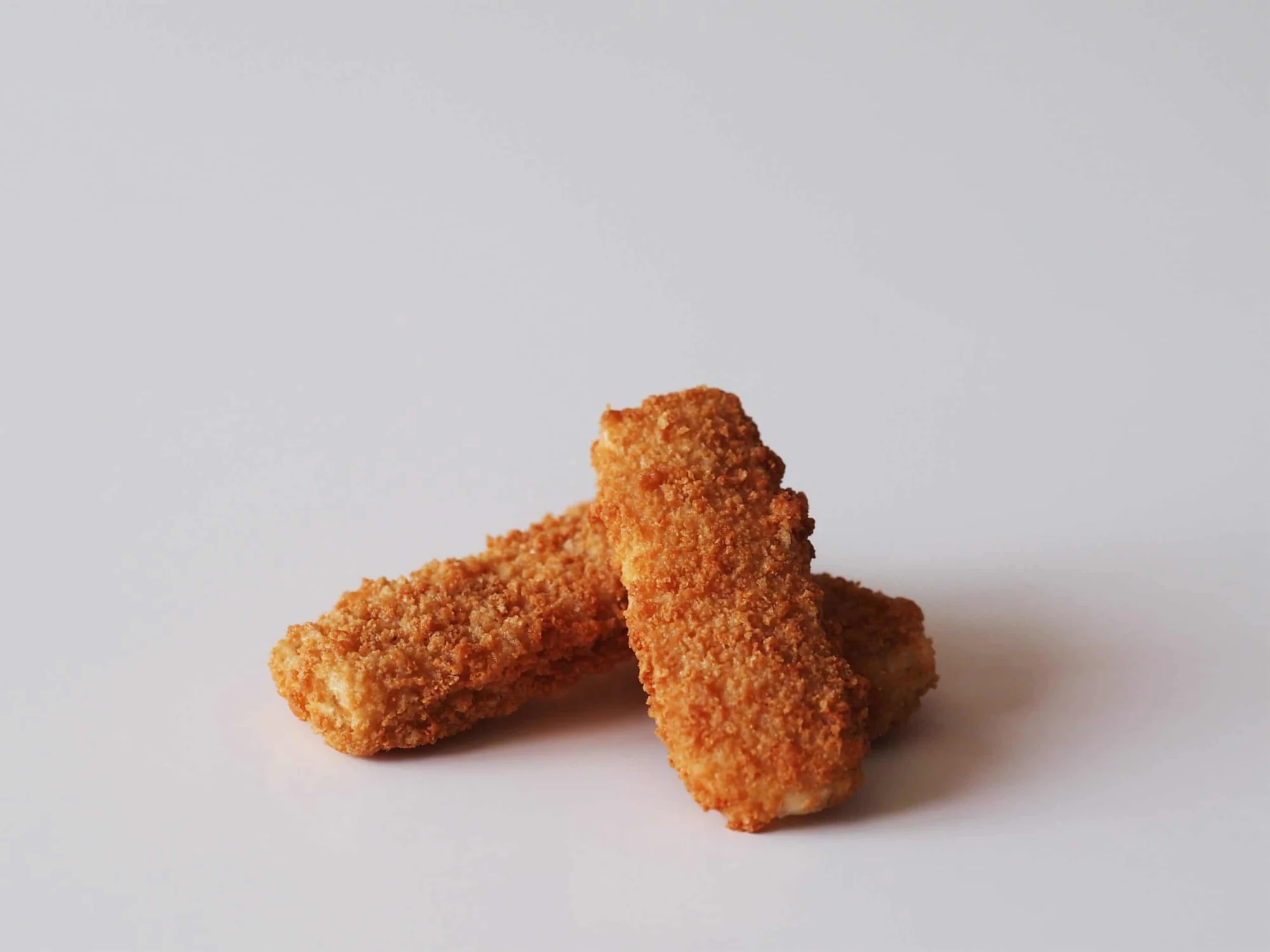 two fish sticks before being served to babies starting solids