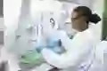 A scientist analyzes a medical sample in a lab medical research lab