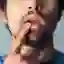 Adult man touching his lips