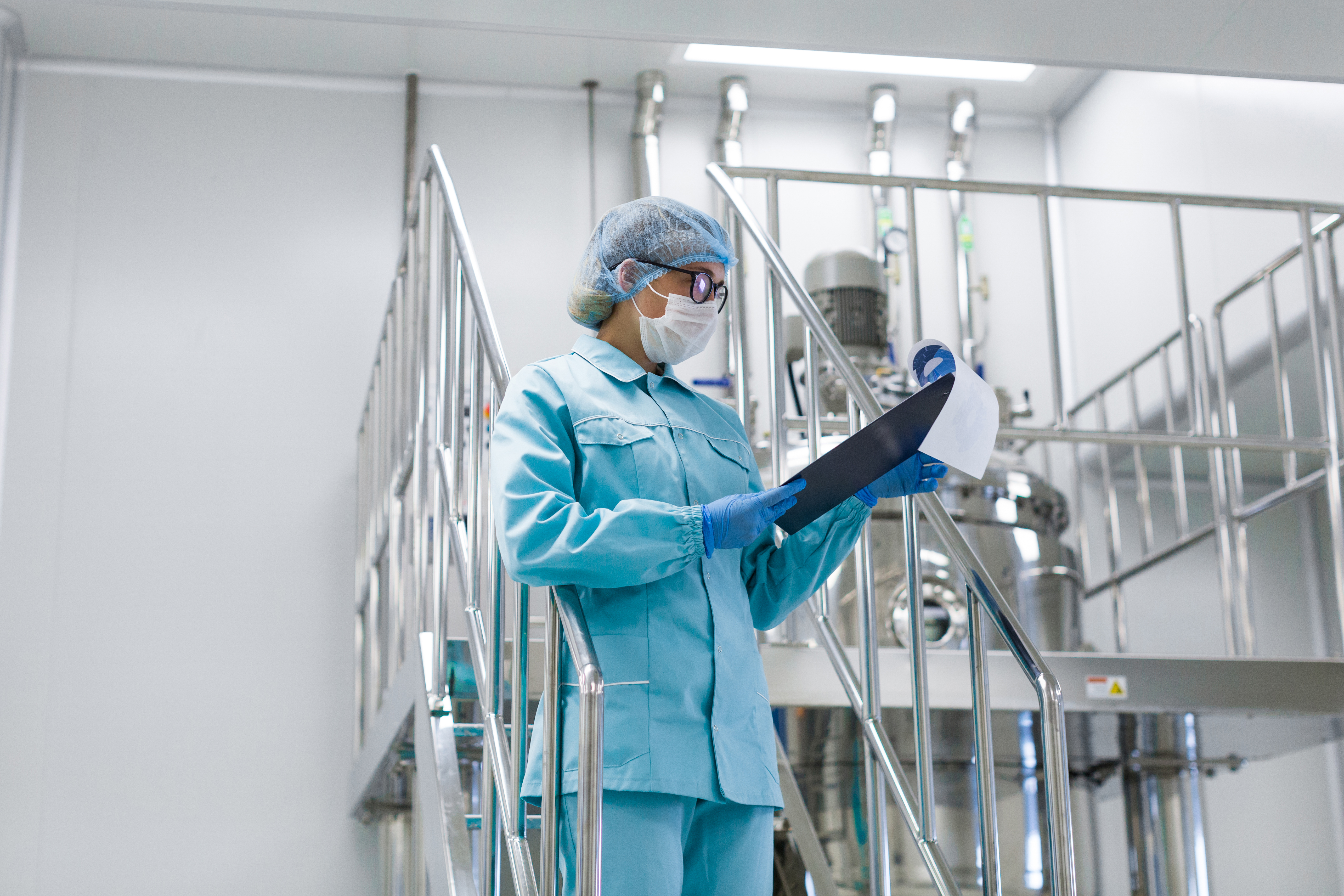 scientist-monitors-readings-equipment
