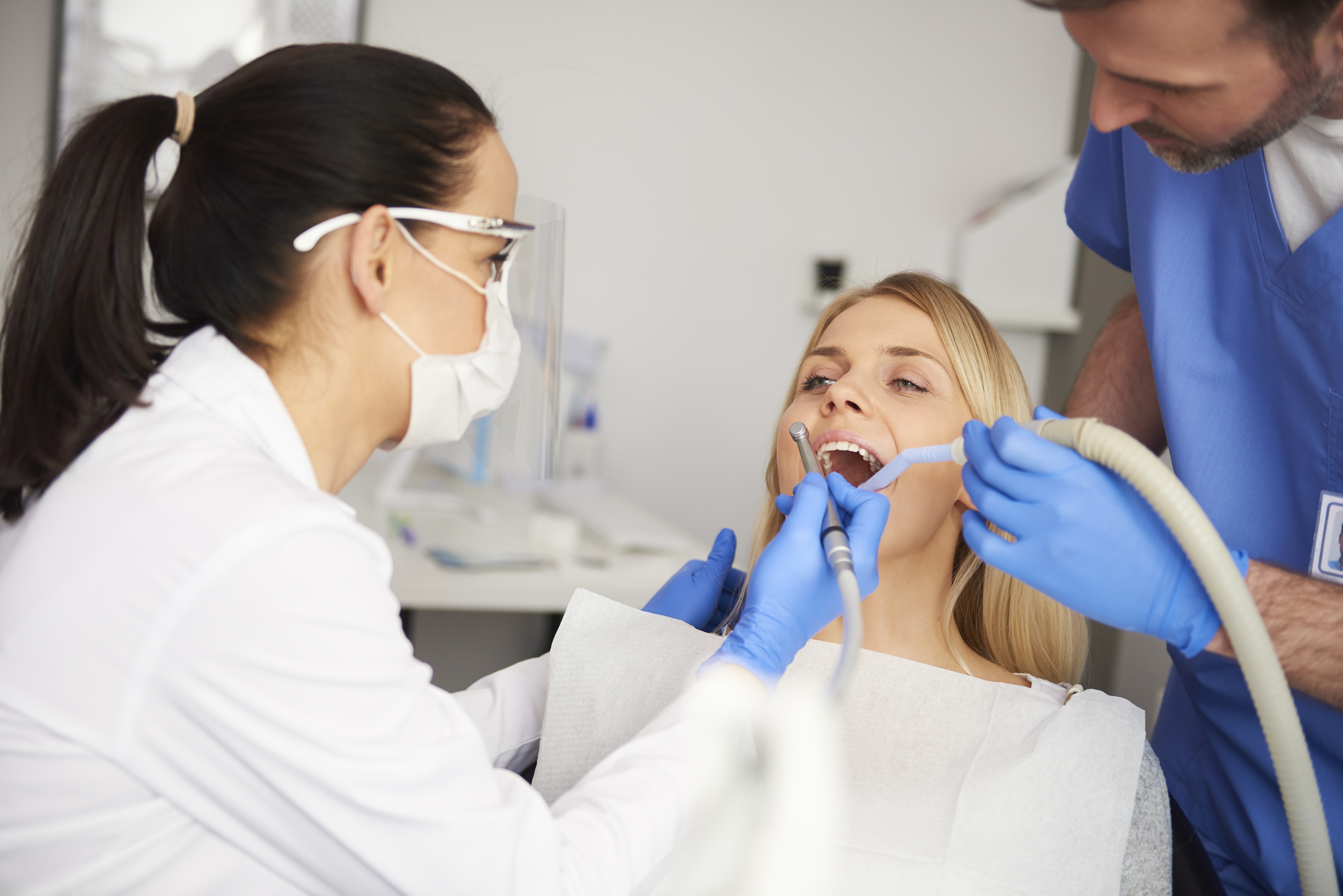 two-dentists-doing-their-work-dentist-s-clinic