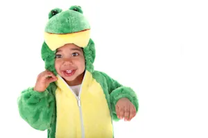 Why did the little boy dress up as a frog for Halloween? image