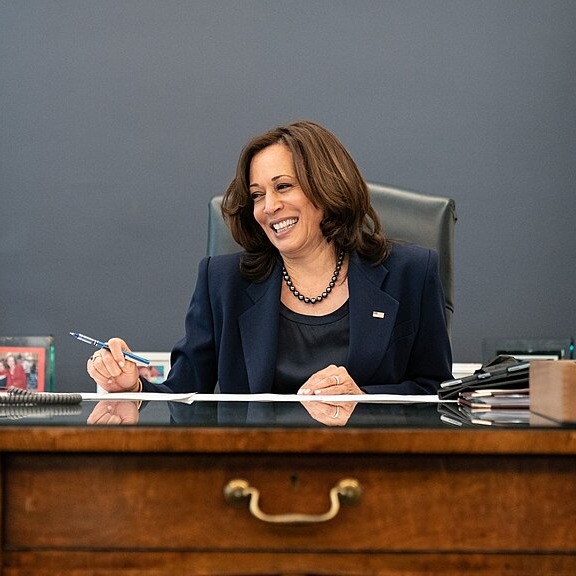 Kamala Harris on the phone with Justin Trudeau