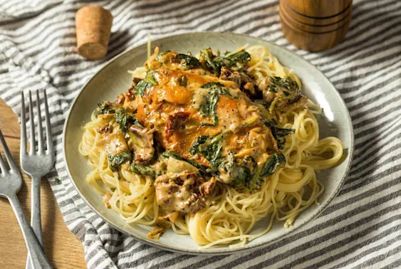 Slow Cooker Tuscan Garlic Chicken with Sun-Dried Tomatoes image