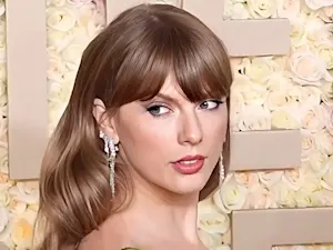 Taylor Swift at the Golden Globes 2024 (Enhanced, cropped) 2