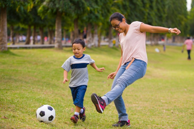  Why did the mom decide to play soccer in her spare time? image
